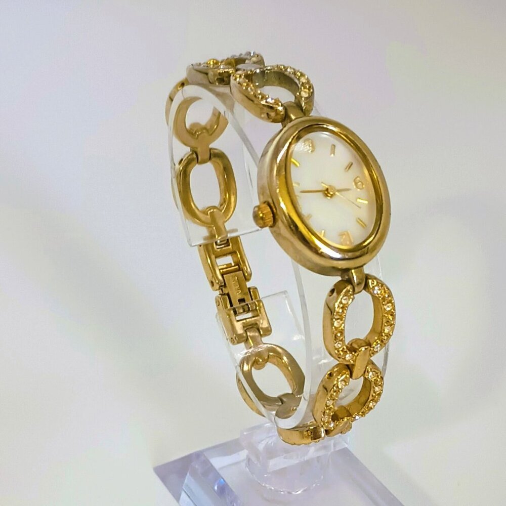 Christian Benet Link Bracelet Watch 6.25 Ladies Gold Tone Rhinestone & Studs